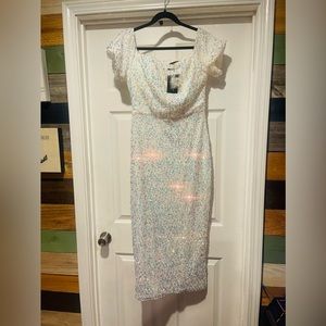 Beautiful bright white sequence over the knee dress.